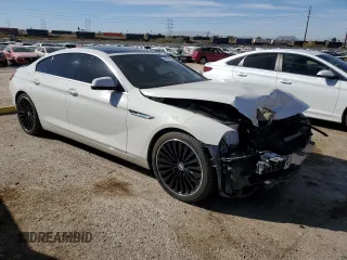 2013 BMW 6 Series 650i with VIN WBA6B2C51DDG66564, listed as a Copart auction lot 44247555 with 89,477 mi miles and Salvage Title. Bid and sale history available at DreamBid. Image 4.