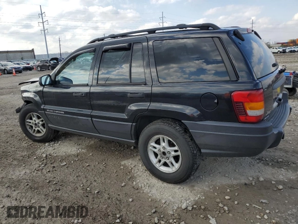 2004 Jeep Grand Cherokee Laredo with VIN 1J4GW48S84C184757, listed as a Copart auction lot 52895745 with 242,307 mi miles and Salvage Title. Bid and sale history available at carsss.com. Image 2.