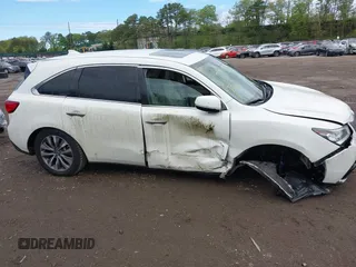 2016 Acura MDX Technology z VIN 5FRYD4H47GB040270, wystawiony jako IAAI lot #42196645 z przebiegiem 72 100 mil mil oraz . Historia ofert i sprzedaży dostępna na DreamBid. Obrazek 13.