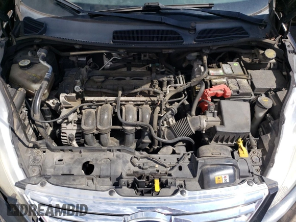 2012 Ford Fiesta SE z VIN 3FADP4BJ5CM195837, wystawiony jako Copart lot #57363165 z przebiegiem 108 003 mil mil oraz Szkoda całkowita • Salvage title. Historia ofert i sprzedaży dostępna na DreamBid. Obrazek 11.