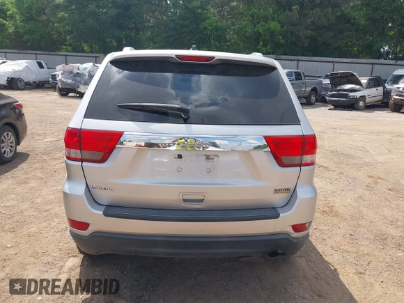2012 Jeep Grand Cherokee Laredo with VIN 1C4RJEAG4CC251359, listed as a IAAI auction lot 41986762 with 172,331 mi miles. Bid and sale history available at carsss.com. Image 16.