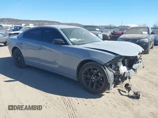 2022 Dodge Charger SXT with VIN 2C3CDXBG7NH208839, listed as a IAAI auction lot 41701171 with 71,552 mi miles and . Bid and sale history available at carsss.com. Image 1.