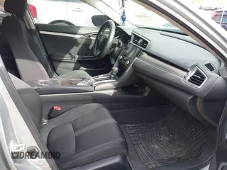 2018 Honda Civic EX-T z VIN 2HGFC1F34JH641837, wystawiony jako IAAI lot #41858089 z przebiegiem 65 318 mil mil oraz . Historia ofert i sprzedaży dostępna na DreamBid. Obrazek 5.
