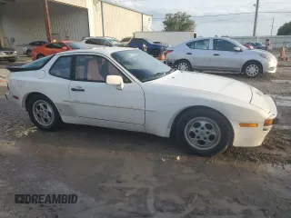 1987 Porsche 944 z VIN WP0AB0948HN473051, wystawiony jako Copart lot #73666654 z przebiegiem 82 580 mil mil oraz Szkoda całkowita • Salvage title. Historia ofert i sprzedaży dostępna na DreamBid. Obrazek 4.