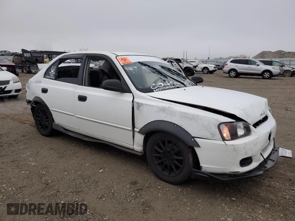 2002 Hyundai Accent GL with VIN KMHCG45C92U271388, listed as a Copart auction lot 85925124 with 98,390 mi miles and Salvage Title. Bid and sale history available at carsss.com. Image 4.