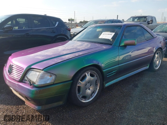 1990 Mercedes-Benz 500 z VIN WDBFA66E7LF005953, wystawiony jako IAAI lot #42224846 z przebiegiem 87 388 mil mil oraz . Historia ofert i sprzedaży dostępna na DreamBid. Obrazek 2.