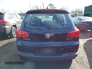 2015 Volkswagen Tiguan SE z VIN WVGAV7AX2FW593453, wystawiony jako IAAI lot #41658359 z przebiegiem 159 619 mil mil oraz . Historia ofert i sprzedaży dostępna na DreamBid. Obrazek 16.