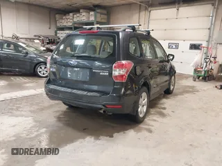 2016 Subaru Forester 2.5i with VIN JF2SJABC1GH421242, listed as a IAAI auction lot 41910942 with 104,217 mi miles and . Bid and sale history available at DreamBid. Image 4.