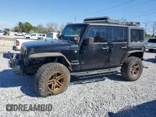 2014 Jeep Wrangler Unlimited Sport with VIN 1C4BJWDGXEL269693, listed as a Copart auction lot 46927895 with 105,691 mi miles and Salvage Title. Bid and sale history available at carsss.com. Image 1.