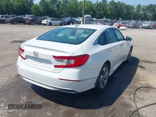 2020 Honda Accord EX with VIN 1HGCV1F40LA031912, listed as a IAAI auction lot 42580982 with 103,757 mi miles and . Bid and sale history available at DreamBid. Image 4.