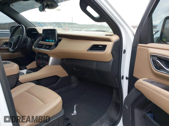 2023 Chevrolet Suburban Premier with VIN 1GNSKFKT1PR529998, listed as a IAAI auction lot 41157457 with 21,551 mi miles and . Bid and sale history available at DreamBid. Image 5.