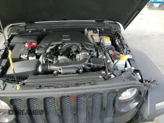 2019 Jeep Wrangler Sport S z VIN 1C4GJXAGXKW579272, wystawiony jako Copart lot #68467615 z przebiegiem 26 886 mil mil oraz Szkoda całkowita • Salvage title. Historia ofert i sprzedaży dostępna na DreamBid. Obrazek 14.