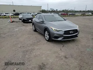 2018 Infiniti QX30 Premium z VIN SJKCH5CP6JA060448, wystawiony jako Copart lot #83436754 z przebiegiem 97 684 mil mil oraz Szkoda całkowita • Salvage title. Historia ofert i sprzedaży dostępna na DreamBid. Obrazek 11.