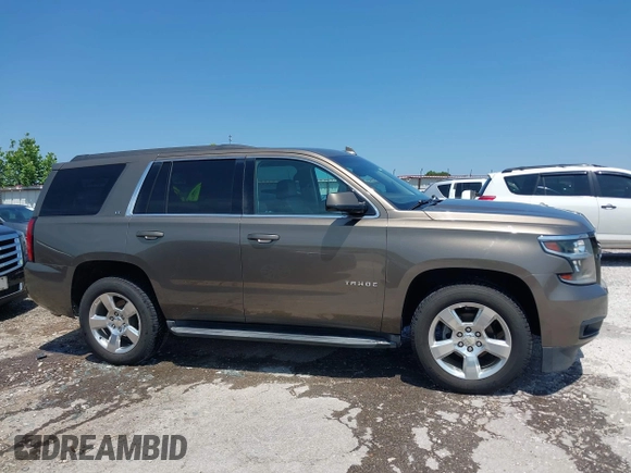 2016 Chevrolet Tahoe LT z VIN 1GNSCBKC8GR210829, wystawiony jako IAAI lot #42459936 z przebiegiem 160 518 mil mil oraz . Historia ofert i sprzedaży dostępna na DreamBid. Obrazek 14.