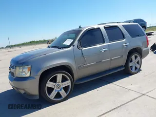 2008 Chevrolet Tahoe 3LT with VIN 1GNFC13018R154833, listed as a IAAI auction lot 42232738 with 243,993 mi miles and . Bid and sale history available at DreamBid. Image 2.
