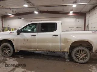 2021 Chevrolet Silverado 1500 LT Trail Boss with VIN 3GCPYFED9MG231471, listed as a IAAI auction lot 41502147 with 74,308 mi miles and . Bid and sale history available at DreamBid. Image 14.