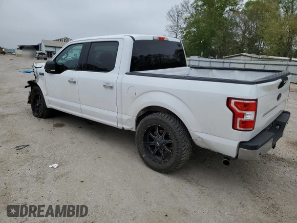 2018 Ford F-150 XL with VIN 1FTEW1C53JKC18828, listed as a Copart auction lot 50357415 with 128,689 mi miles and Salvage Title. Bid and sale history available at DreamBid. Image 2.