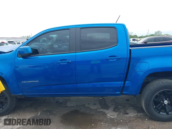 2021 Chevrolet Colorado 2WD LT z VIN 1GCGSCEN9M1226777, wystawiony jako IAAI lot #41895262 z przebiegiem 68 065 mil mil oraz . Historia ofert i sprzedaży dostępna na DreamBid. Obrazek 14.