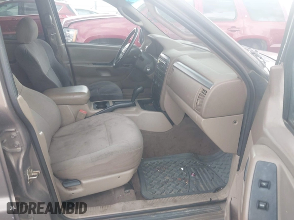 2002 Jeep Grand Cherokee Laredo with VIN 1J4GX48S32C168105, listed as a IAAI auction lot 42451373 with 293,790 mi miles and . Bid and sale history available at DreamBid. Image 5.