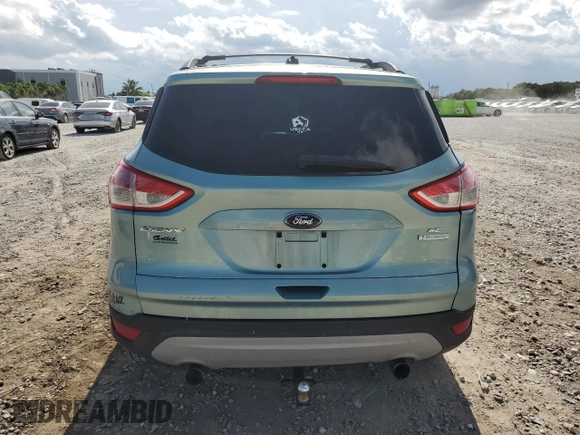 2013 Ford Escape SE z VIN 1FMCU0GX8DUA92814, wystawiony jako Copart lot #61564665 z przebiegiem 110 854 mil mil oraz Szkoda całkowita • Salvage title. Historia ofert i sprzedaży dostępna na DreamBid. Obrazek 6.