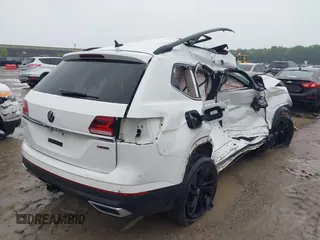 2022 Volkswagen Atlas SE with VIN 1V2KR2CA0NC509427, listed as a IAAI auction lot 42440164 with 52,898 mi miles and . Bid and sale history available at DreamBid. Image 4.