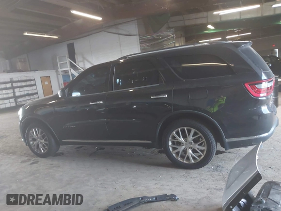 2014 Dodge Durango Citadel with VIN 1C4RDJEG1EC466162, listed as a IAAI auction lot 42560400 with 154,628 mi miles and . Bid and sale history available at DreamBid. Image 14.