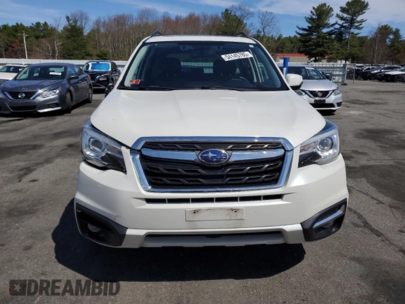 2018 Subaru Forester Touring z VIN JF2SJAWC6JH573079, wystawiony jako Copart lot #54145785 z przebiegiem 74 208 mil mil oraz Szkoda całkowita • Salvage title. Historia ofert i sprzedaży dostępna na DreamBid. Obrazek 5.
