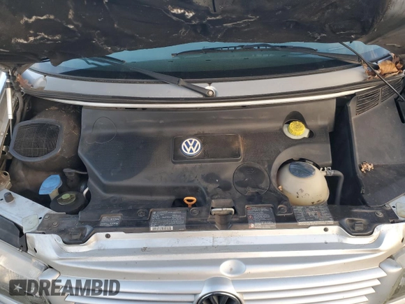 2003 Volkswagen EuroVan MV с VIN WV2MB47053H002505, выставлен на аукционе Copart как лот 83840884 с пробегом 250 786 миль миль и Чистый • Clean title. История ставок и продаж доступна на DreamBid. Изображение 12.