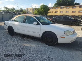 2004 Mercury Sable GS with VIN 1MEFM50U04A607318, listed as a Copart auction lot 61866155 with 149,973 mi miles and Salvage title. Bid and sale history available at DreamBid. Image 4.