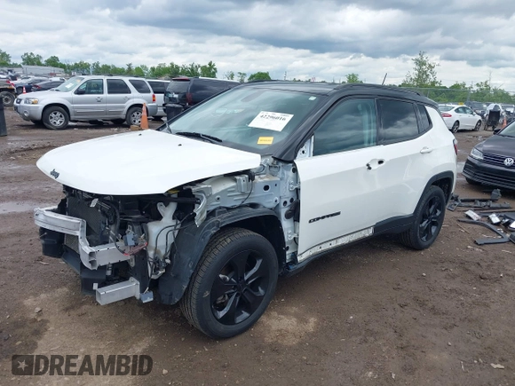 2021 Jeep Compass Altitude with VIN 3C4NJDBBXMT586529, listed as a IAAI auction lot 42296016 with 71,789 mi miles and . Bid and sale history available at DreamBid. Image 2.