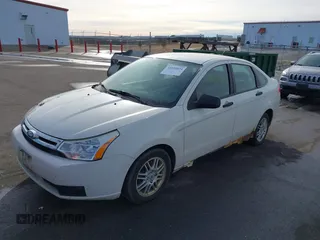 2011 Ford Focus SE with VIN 1FAHP3FN0BW180640, listed as a IAAI auction lot 41638824 with 287,000 mi miles. Bid and sale history available at carsss.com. Image 2.