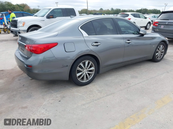 2015 Infiniti Q50 with VIN JN1BV7AP7FM357534, listed as a IAAI auction lot 41440900 with 101,982 mi miles. Bid and sale history available at carsss.com. Image 4.