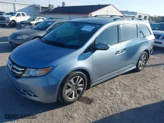 2014 Honda Odyssey Touring with VIN 5FNRL5H98EB102430, listed as a IAAI auction lot 41683822 with 185,802 mi miles. Bid and sale history available at carsss.com. Image 2.