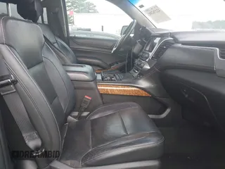2018 Chevrolet Suburban Premier with VIN 1GNSCJKC9JR100504, listed as a IAAI auction lot 42276280 with 153,916 mi miles and . Bid and sale history available at DreamBid. Image 5.
