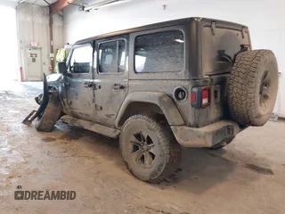 2020 Jeep Wrangler Unlimited Sport Altitude с VIN 1C4HJXDG4LW120627, выставлен на аукционе IAAI как лот 41728593 с пробегом 63 565 миль миль и . История ставок и продаж доступна на DreamBid. Изображение 3.