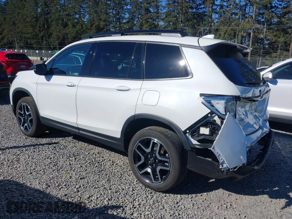 2023 Honda Passport Elite with VIN 5FNYF8H01PB004087, listed as a IAAI auction lot 42045433 with 20,677 mi miles and . Bid and sale history available at DreamBid. Image 3.
