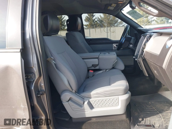 2011 Ford F-150 XLT with VIN 1FTFW1ET7BFC47792, listed as a IAAI auction lot 41765574 with 174,001 mi miles. Bid and sale history available at carsss.com. Image 5.
