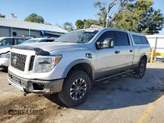 2016 Nissan Titan XD PRO-4X with VIN 1N6BA1F4XGN509643, listed as a Copart auction lot 74530434 with 83,734 mi miles and Clean Title. Bid and sale history available at carsss.com. Image 1.