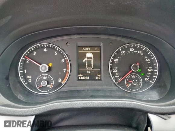 2012 Volkswagen Passat SE z VIN 1VWBH7A39CC050611, wystawiony jako Copart lot #51877065 z przebiegiem 134 058 mil mil oraz Szkoda całkowita • Salvage title. Historia ofert i sprzedaży dostępna na DreamBid. Obrazek 9.