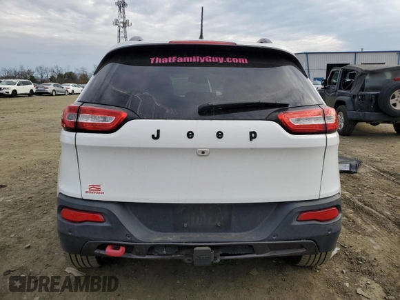2015 Jeep Cherokee Trailhawk z VIN 1C4PJMBB1FW528766, wystawiony jako Copart lot #46879355 z przebiegiem 248 676 mil mil oraz Szkoda całkowita • Salvage title. Historia ofert i sprzedaży dostępna na DreamBid. Obrazek 6.