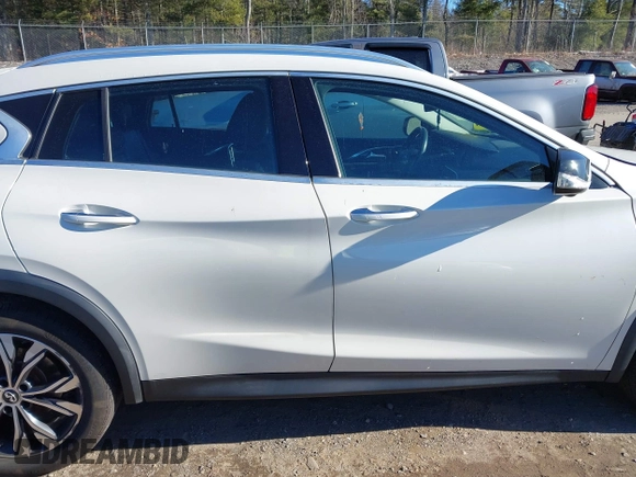 2018 Infiniti QX30 Luxury with VIN SJKCH5CR0JA056820, listed as a IAAI auction lot 40974821 with 71,902 mi miles and . Bid and sale history available at DreamBid. Image 13.