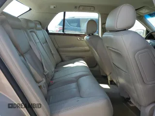 2007 Cadillac DTS Luxury I z VIN 1G6KD57Y37U110200, wystawiony jako Copart lot #52866815 z przebiegiem 157 393 mil mil oraz Szkoda całkowita • Salvage title. Historia ofert i sprzedaży dostępna na DreamBid. Obrazek 10.