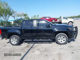 2021 Chevrolet Colorado 2WD LT z VIN 1GCGSCEN1M1131727, wystawiony jako IAAI lot #42181484 z przebiegiem 54 764 mil mil oraz . Historia ofert i sprzedaży dostępna na DreamBid. Obrazek 13.