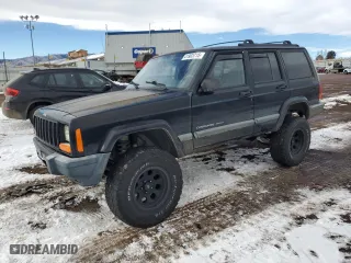 2000 Jeep Cherokee Police with VIN 1J4FF48S9YL205293, listed as a Copart auction lot 41903715 with 307,918 mi miles and Salvage Title. Bid and sale history available at carsss.com. Image 1.
