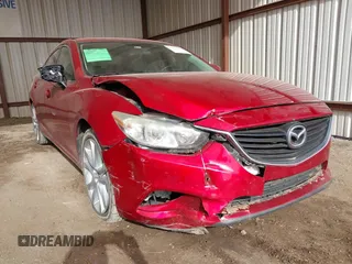 2016 Mazda Mazda6 i Touring with VIN JM1GJ1V58G1425881, listed as a IAAI auction lot 41786149 with 114,638 mi miles. Bid and sale history available at carsss.com. Image 6.