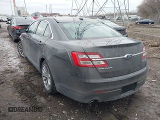 2015 Ford Taurus Limited with VIN 1FAHP2J88FG153326, listed as a IAAI auction lot 41465344 with 98,727 mi miles. Bid and sale history available at carsss.com. Image 3.