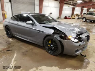 2012 BMW 6 Series 650i xDrive with VIN WBALX5C56CC894132, listed as a Copart auction lot 82968294 with 76,599 mi miles and Clean Title. Bid and sale history available at carsss.com. Image 4.