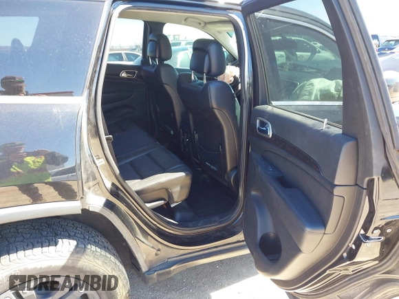 2013 Jeep Grand Cherokee Laredo with VIN 1C4RJFAG2DC643926, listed as a IAAI auction lot 41723575 with 125,048 mi miles. Bid and sale history available at carsss.com. Image 8.