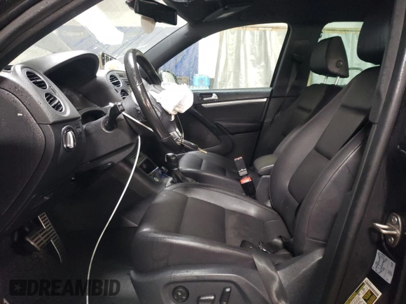 2016 Volkswagen Tiguan R-Line with VIN WVGBV7AX8GW609256, listed as a Copart auction lot 85888204 with 93,165 mi miles and Salvage Title. Bid and sale history available at DreamBid. Image 7.