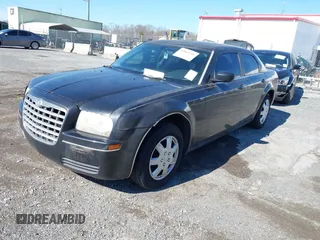 2005 Chrysler 300 with VIN 2C3JA43R25H600920, listed as a IAAI auction lot 41863216 with 1 mi miles. Bid and sale history available at carsss.com. Image 2.